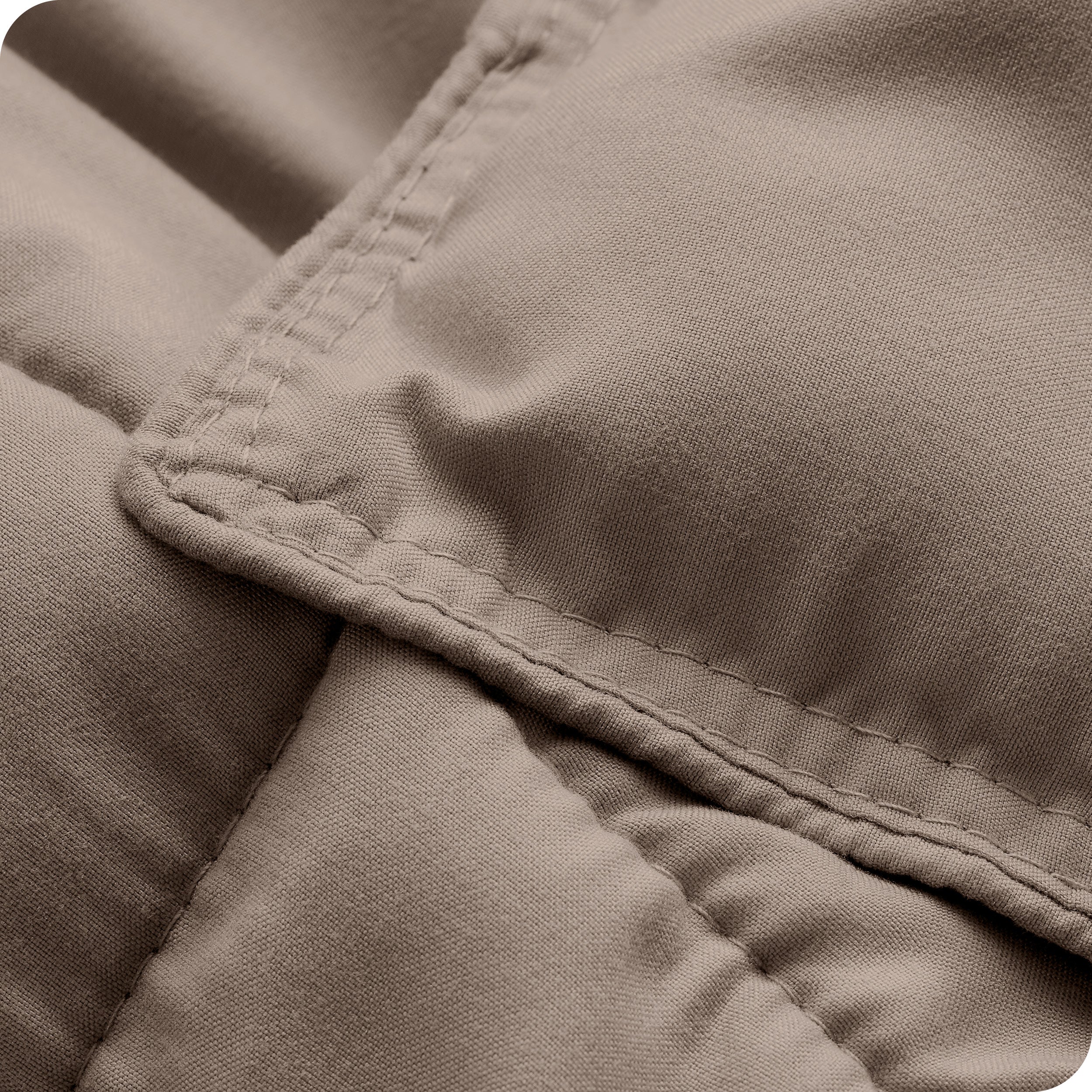 A close up of a corner of the microfiber comforter
