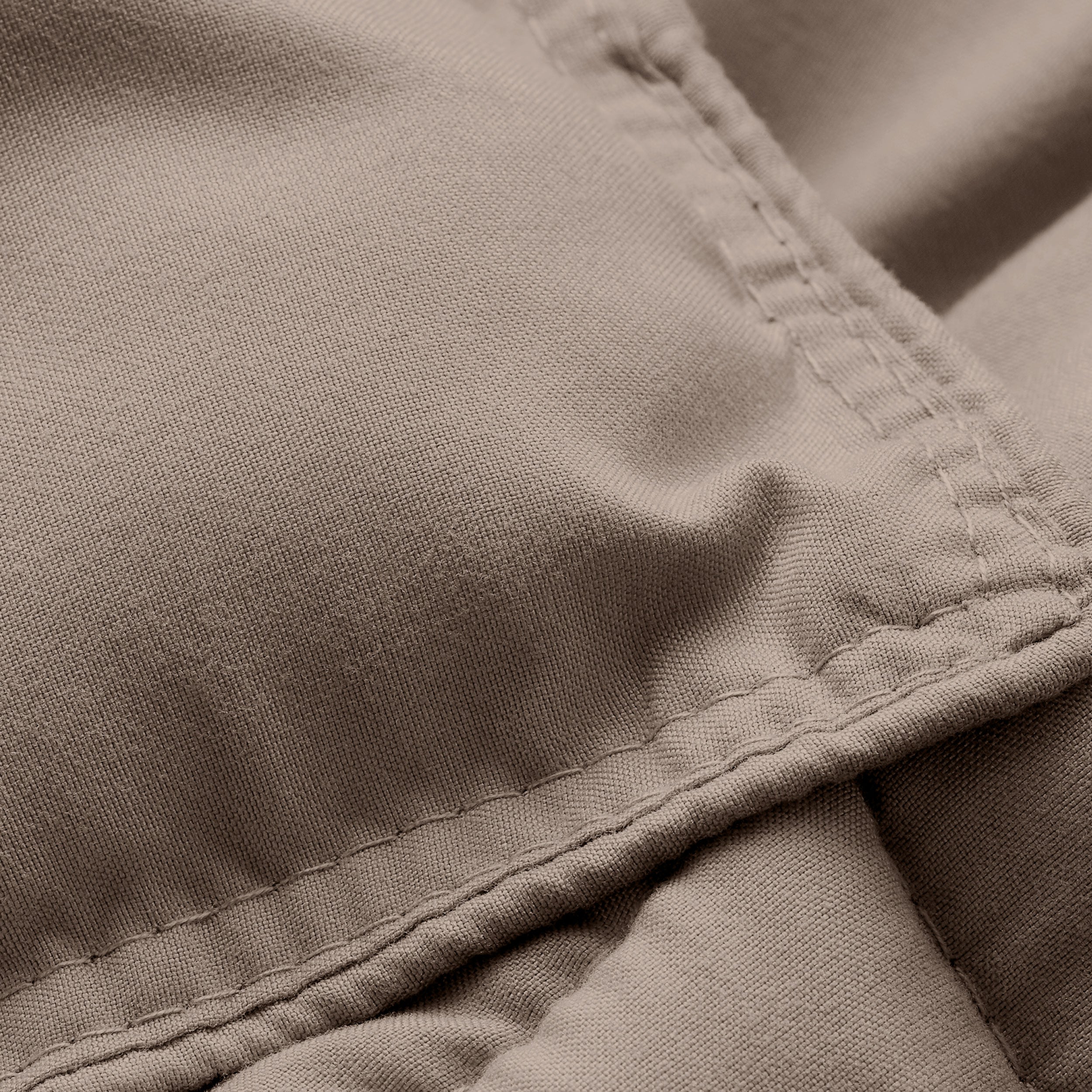 Close-up of comforter fabric with stitching detail