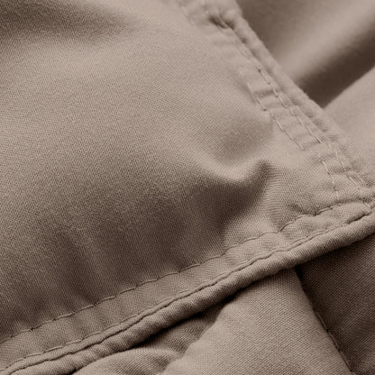 Close-up of comforter fabric with stitching detail