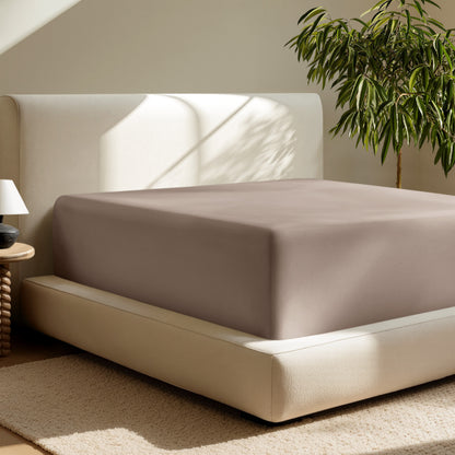 A deep pocket fitted sheet on a mattress