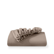 A fitted sheet folded neatly with the all around elastic showing