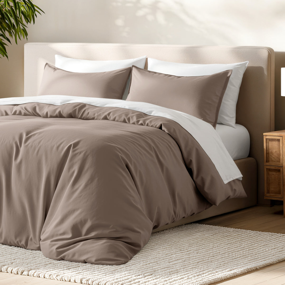 Bed with microfiber duvet cover and sham set in a bedroom setting.