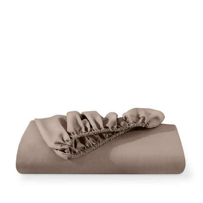 Microfiber fitted sheet folded with a white background
