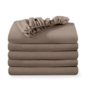 5 ultra soft fitted sheets folded and stacked