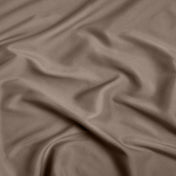 A close-up of ultra soft sheet fabric with soft folds and a smooth texture