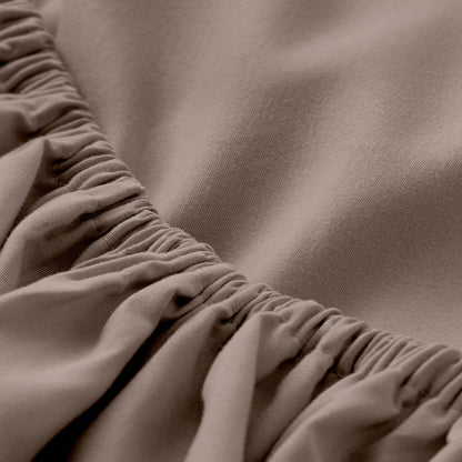 Close-up of fitted sheet with all around elastic