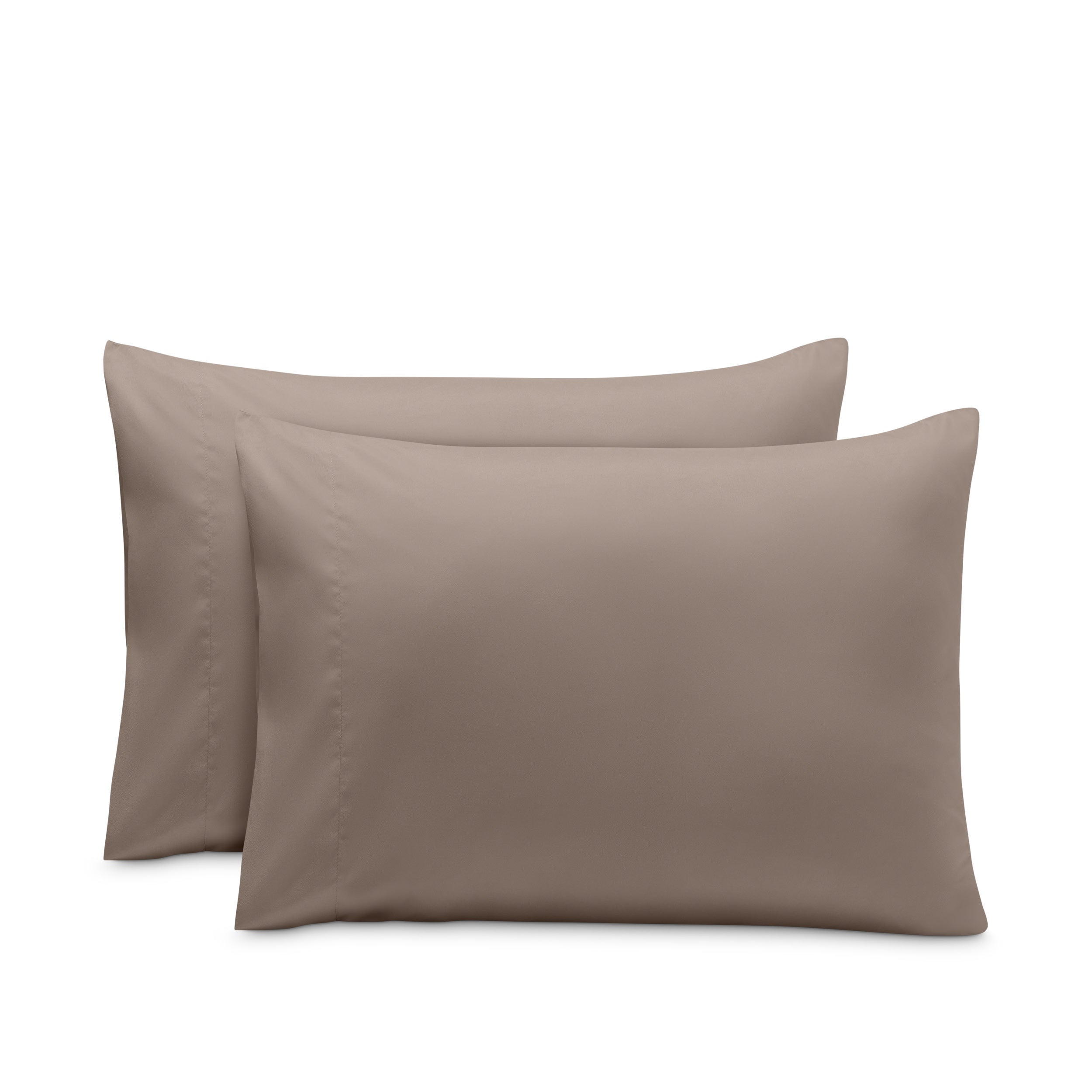 2 pillowcases on pillows