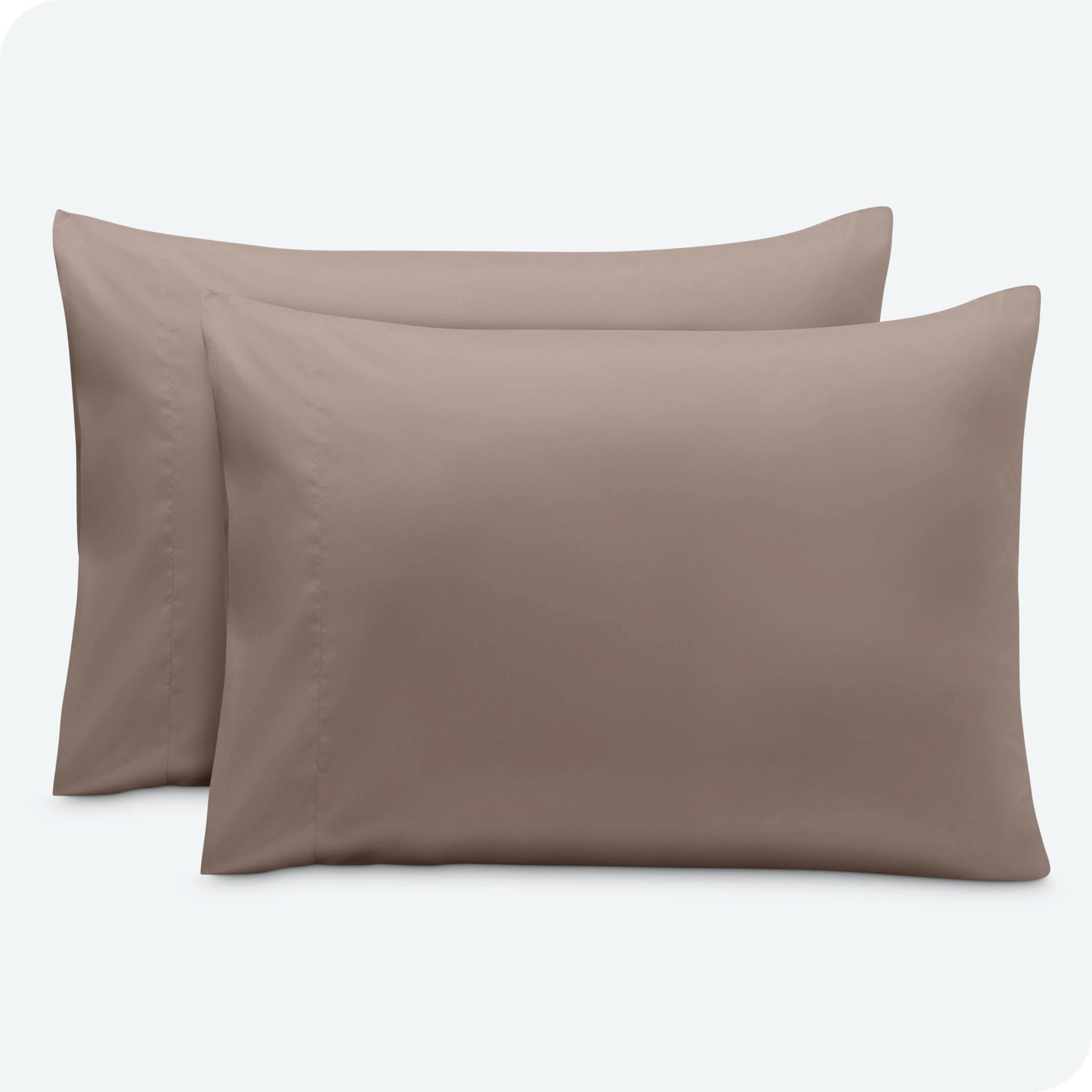 2 pillowcases on pillows