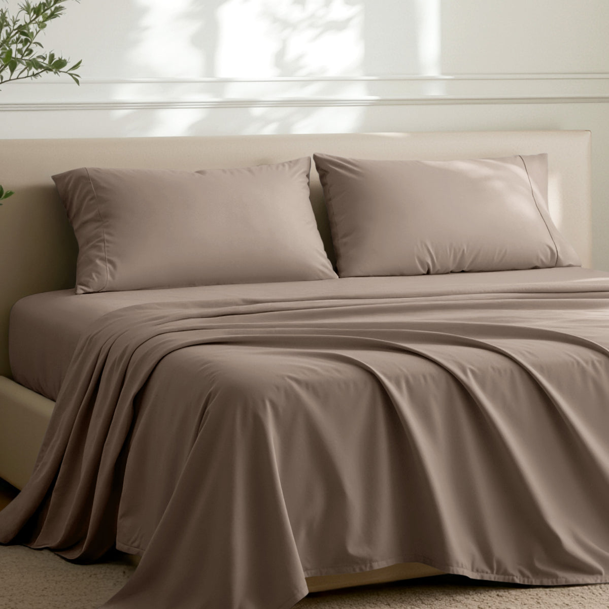 2 pillowcases on pillows on a nicely made bed