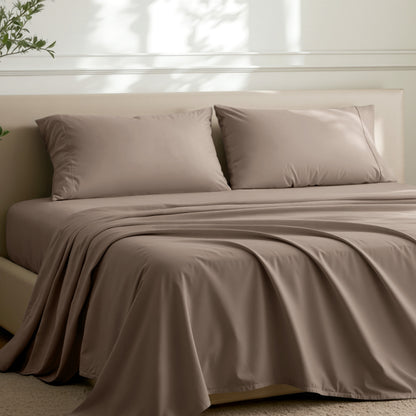 2 pillowcases on pillows on a nicely made bed