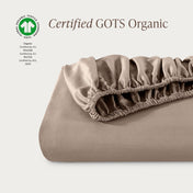 Certified GOTS Organic fitted sheet on a light gray background