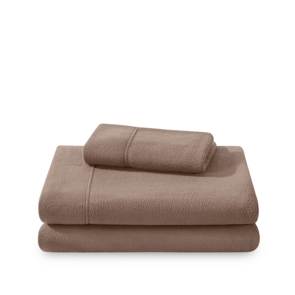 Polar fleece sheets and pillowcases folded and stacked on a white background