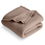 Taupe polar fleece blanket folded with 1 corner folded back