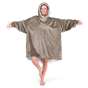 An adult with a hooded wearable blanket on