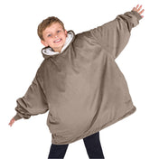 A child with a wearable blanket on