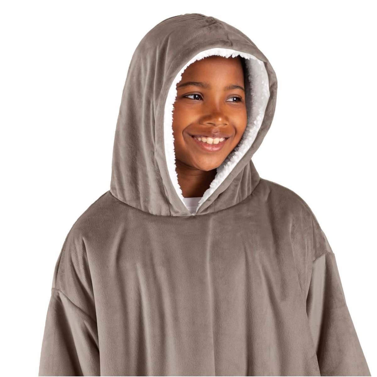 A child with a wearable blanket on