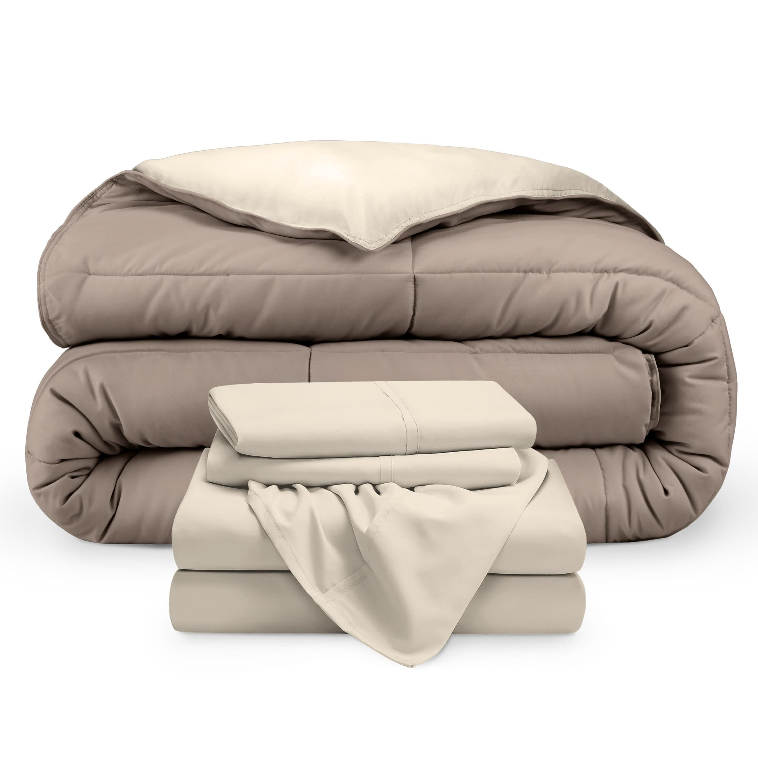 A reversible microfiber comforter and a coordinating sheet set folded and stacked