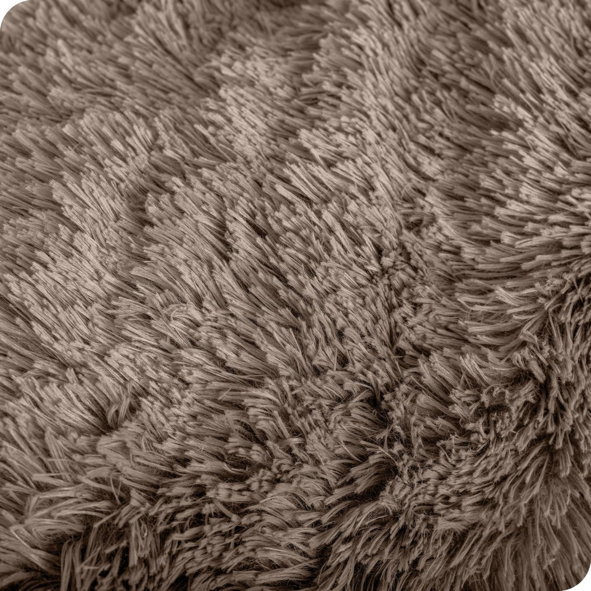 Close up of the soft texture of a shaggy faux fur sherpa blanket