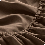 Close-up of fitted sheet with elastic edge