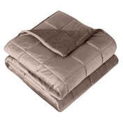 A folded minky weighted blanket with a white background