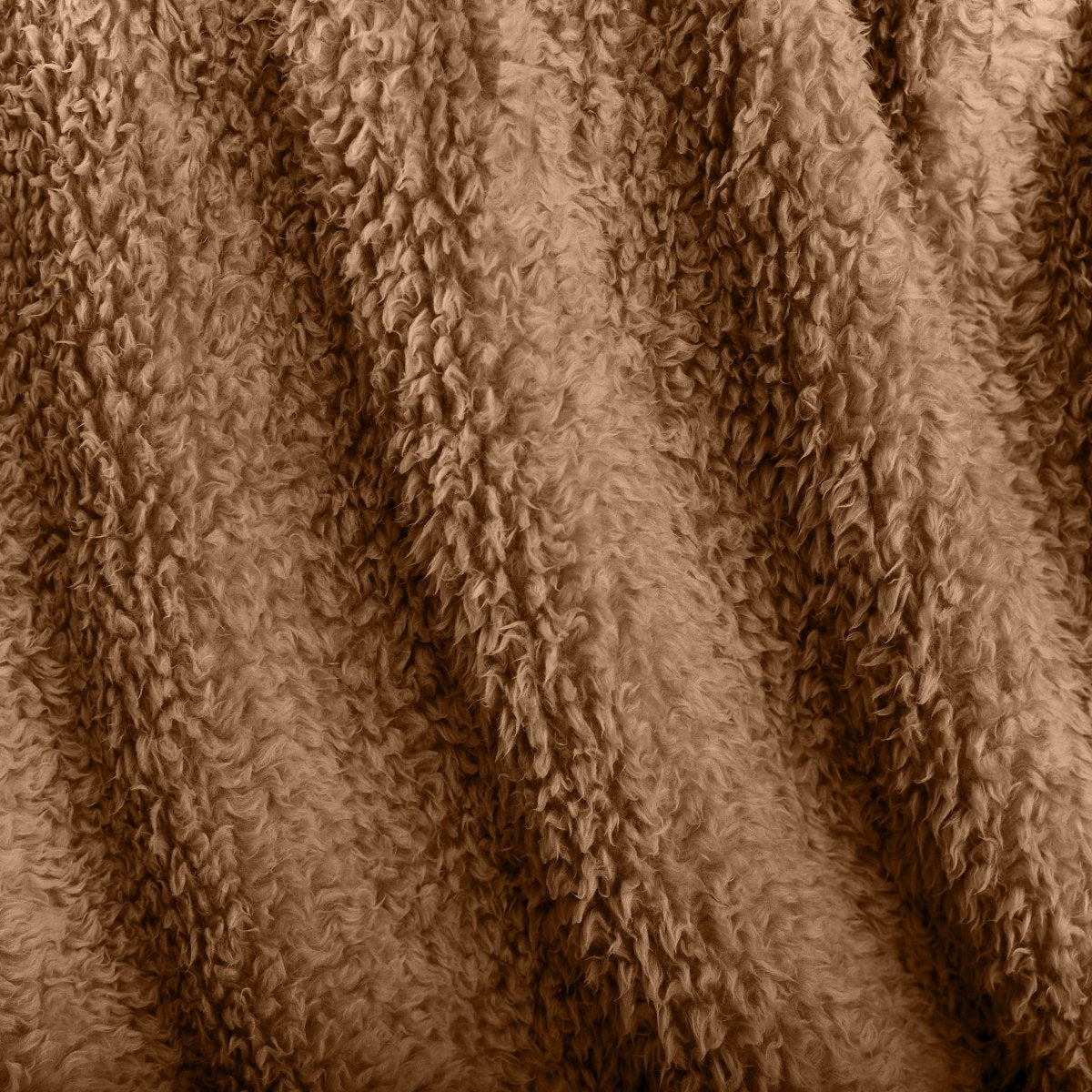 Close-up of textured faux shearling blanket