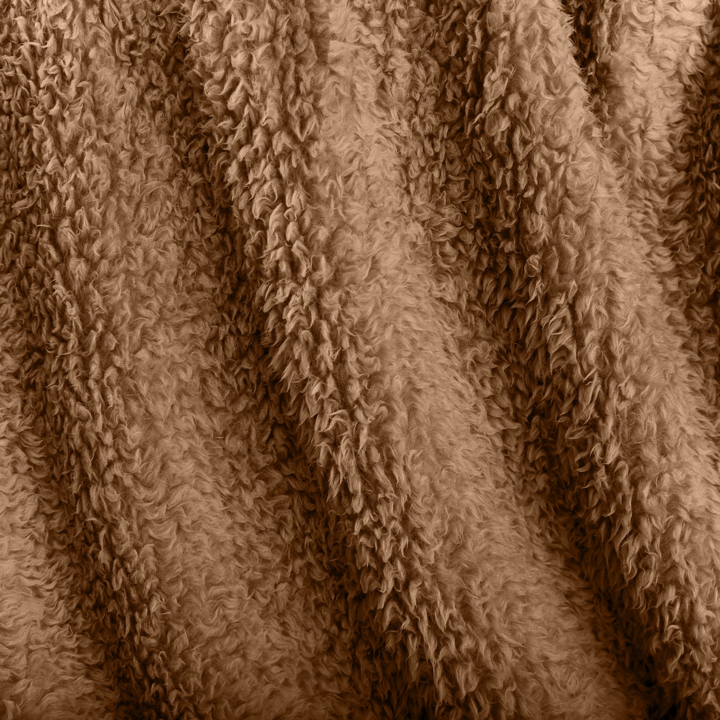 Close-up of textured faux shearling blanket