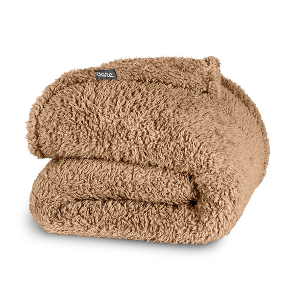 Double sided sherpa blanket folded
