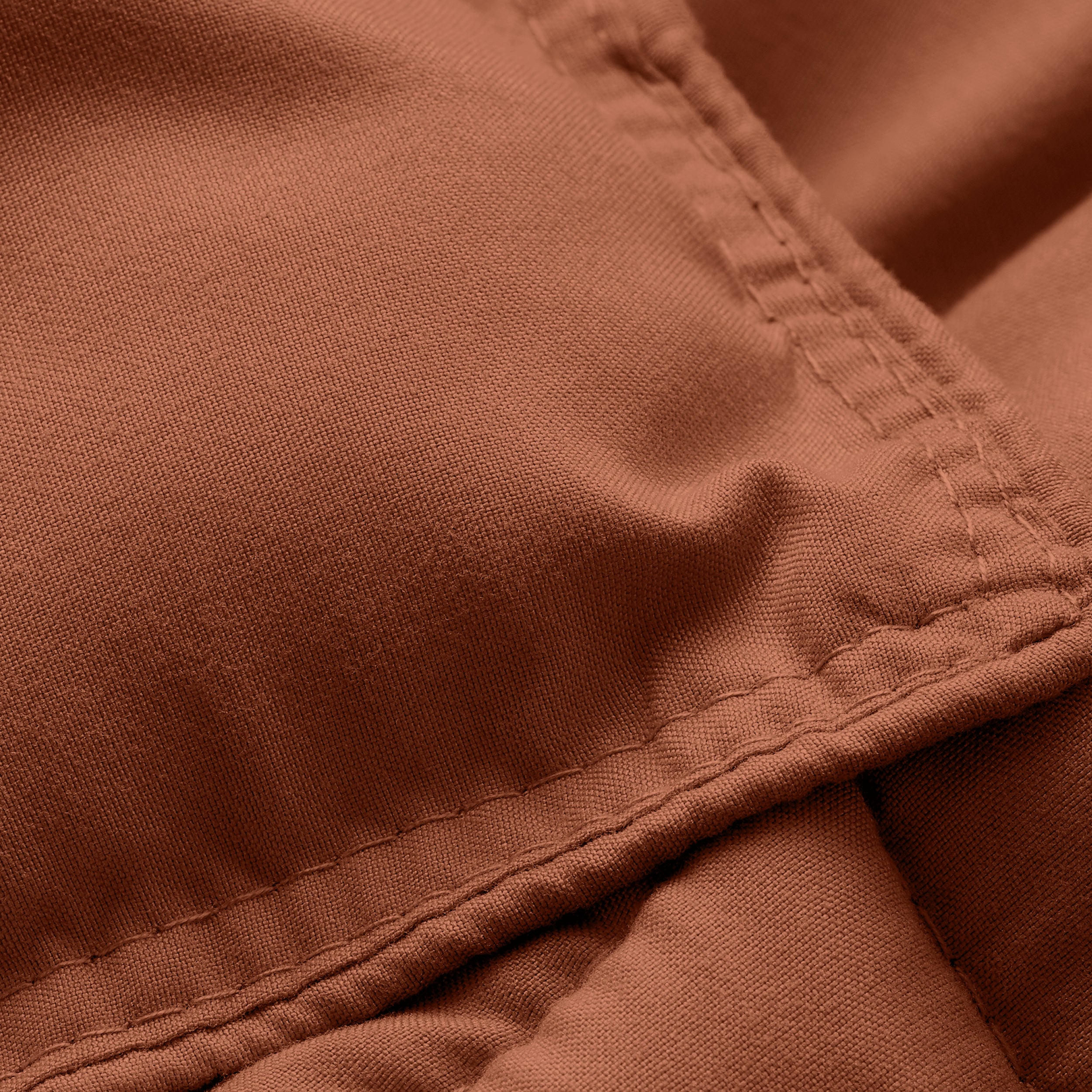 Close-up of comforter fabric with stitching detail