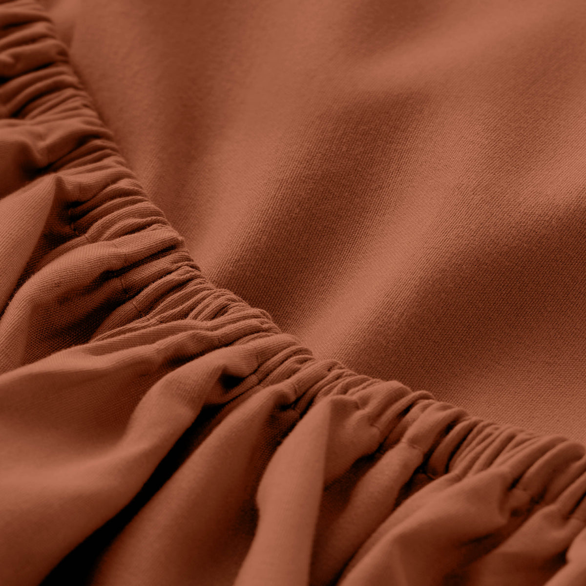 Close-up of fitted sheet with all around elastic