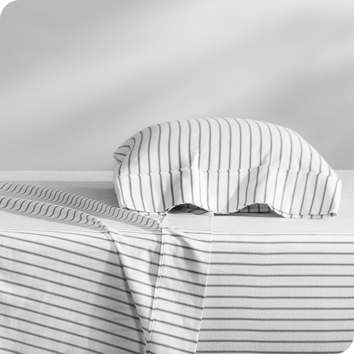 A printed sheet set on a bed
