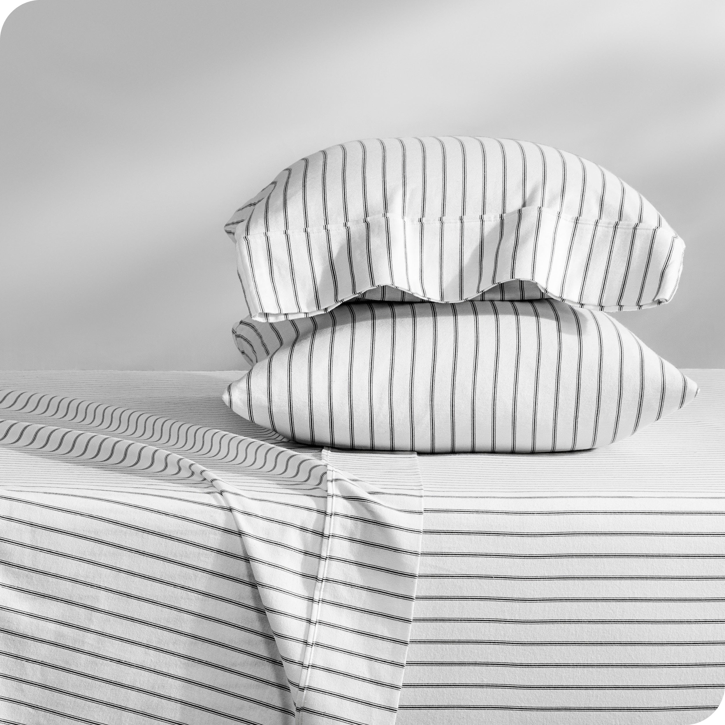 A printed sheet set on a bed
