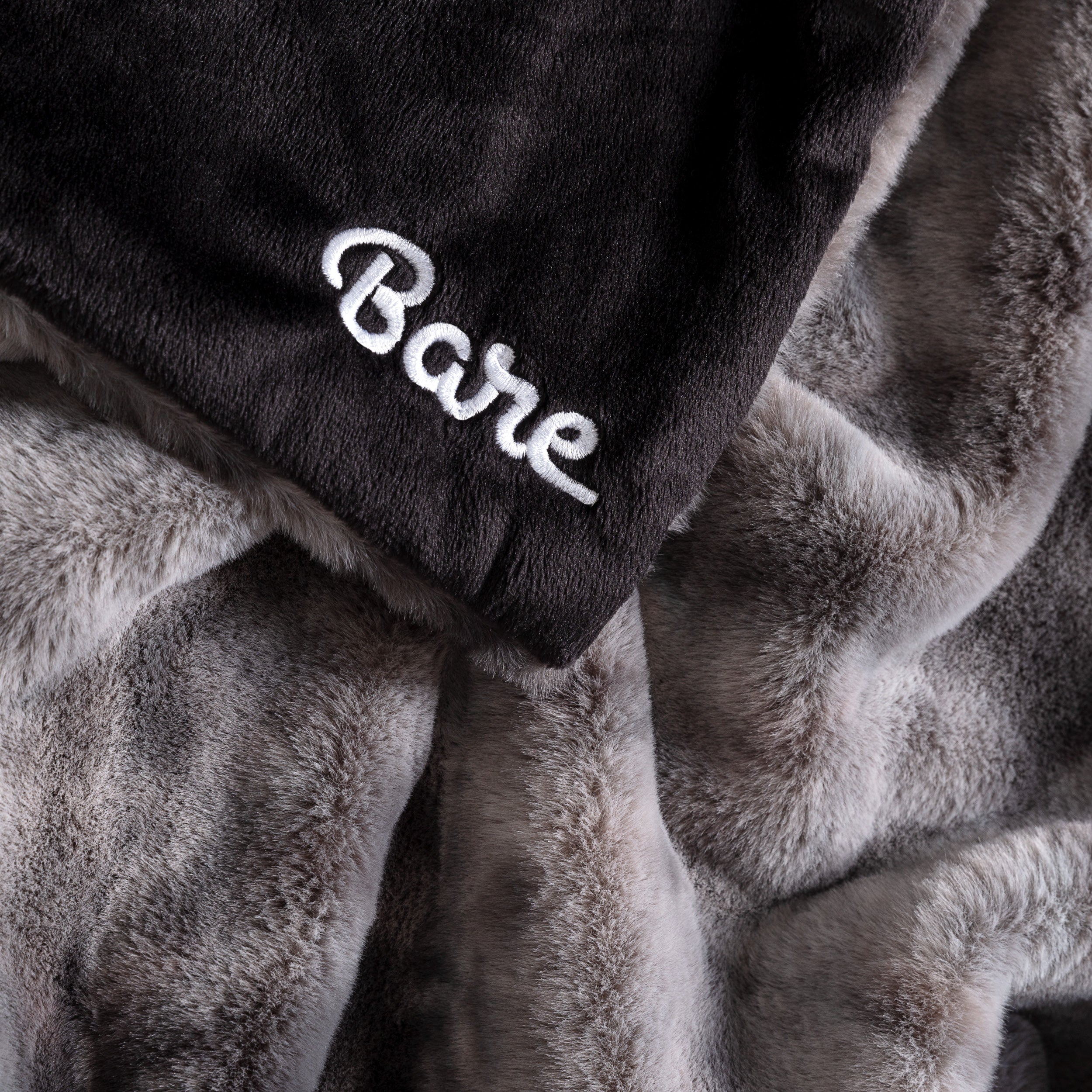 Faux fur blanket with Bare logo