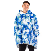 An adult with a sherpa wearable blanket on