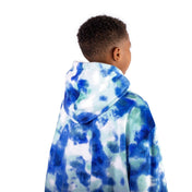 A child with a sherpa wearable blanket on