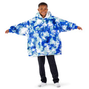 A child wearing a hooded blanket
