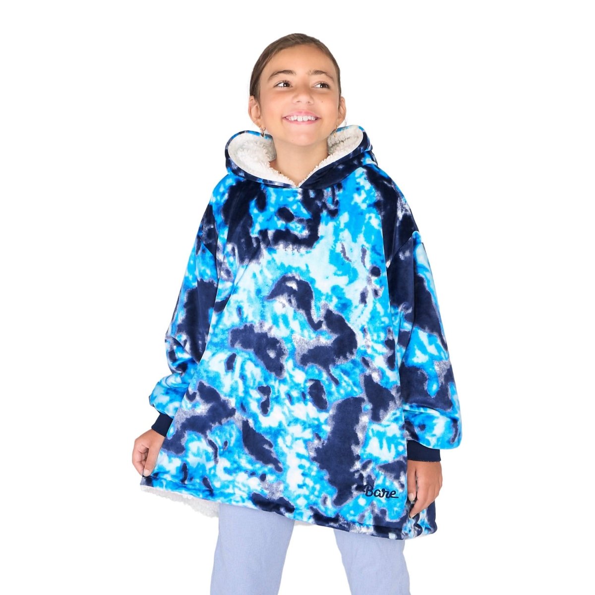 Close up of a sherpa wearable blanket on a child