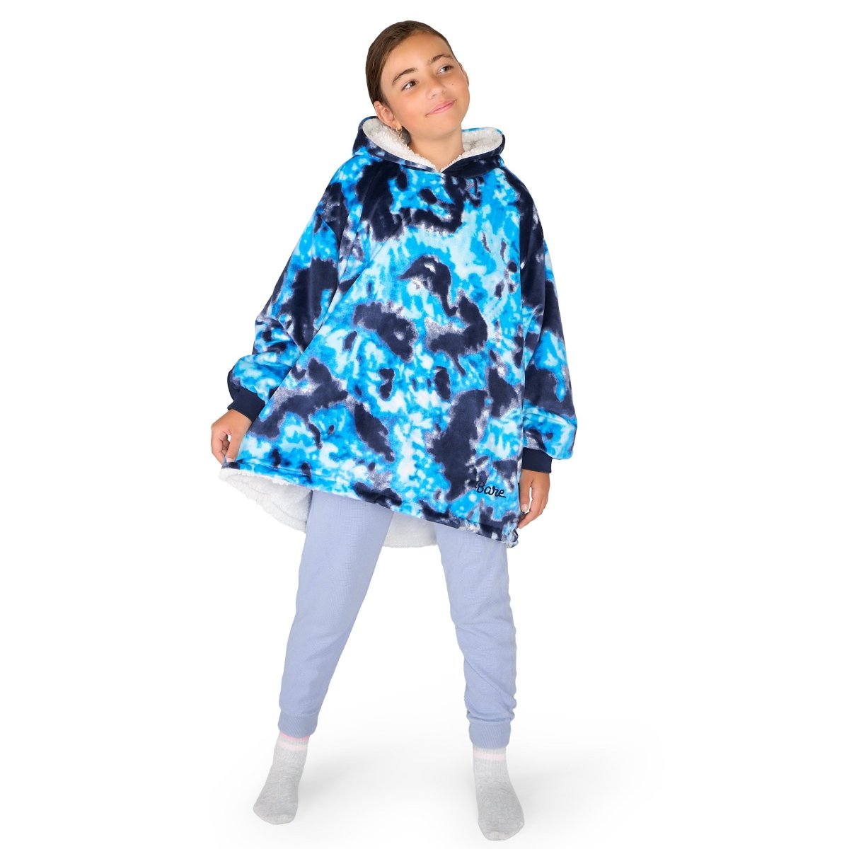 A child wearing a hooded blanket