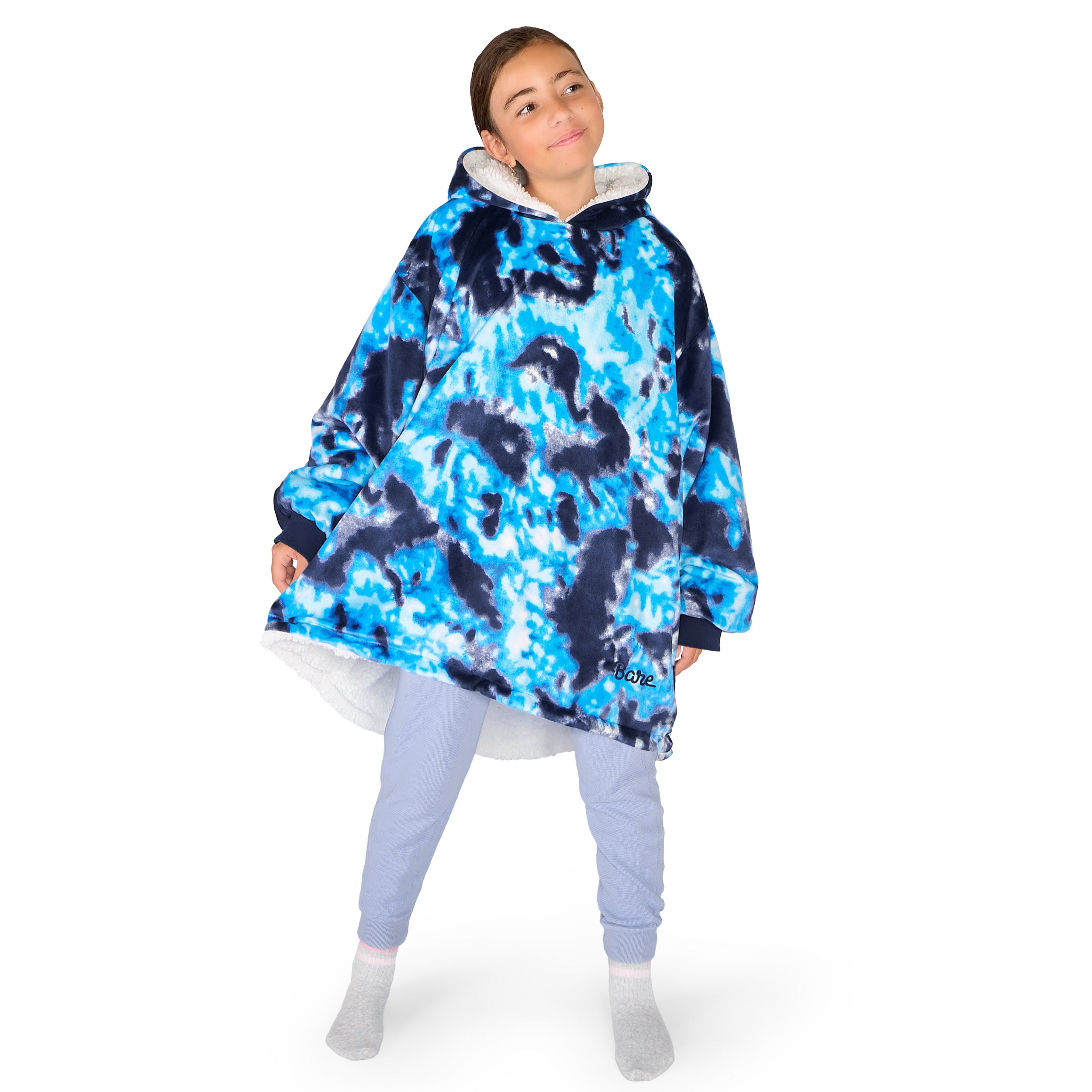 A child wearing a hooded blanket