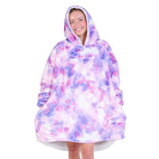 An adult with a sherpa wearable blanket on