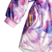 A child with a sherpa wearable blanket on