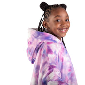 A child with a sherpa wearable blanket on