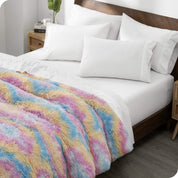 A tie-dye shaggy duvet cover folded neatly