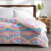 Shaggy duvet on a bed in a bedroom setting with decor elements.