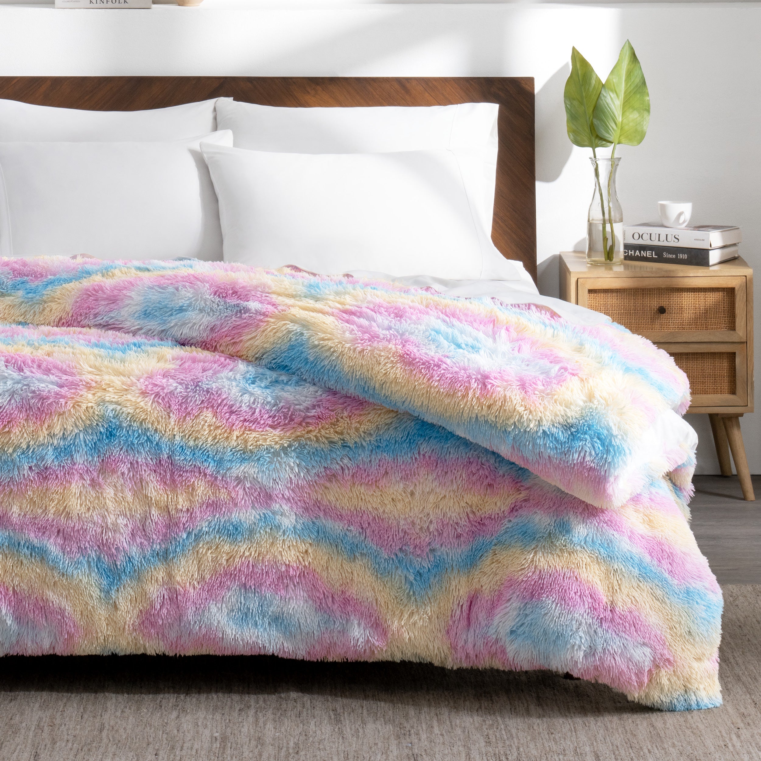 Shaggy duvet on a bed in a bedroom setting with decor elements.