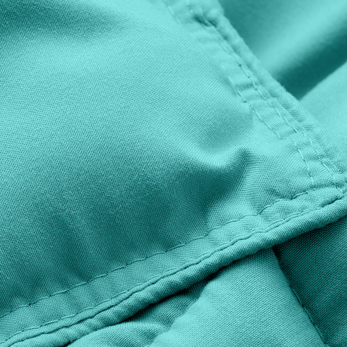 Close-up of comforter fabric with stitching detail