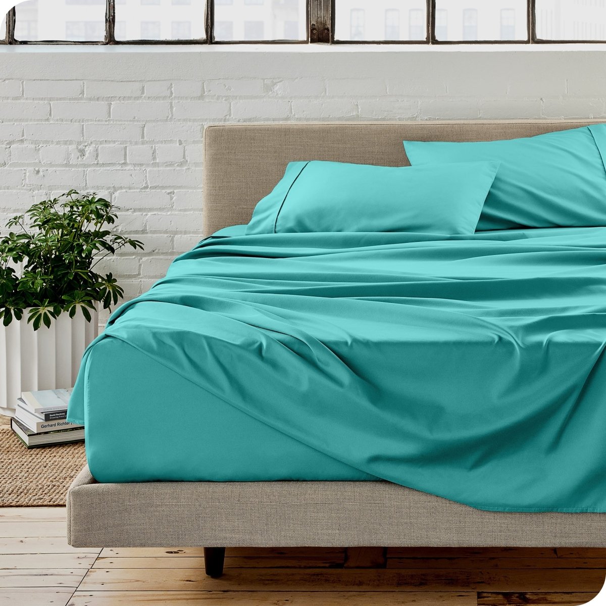 A modern bedroom with microfiber sheets on the mattress