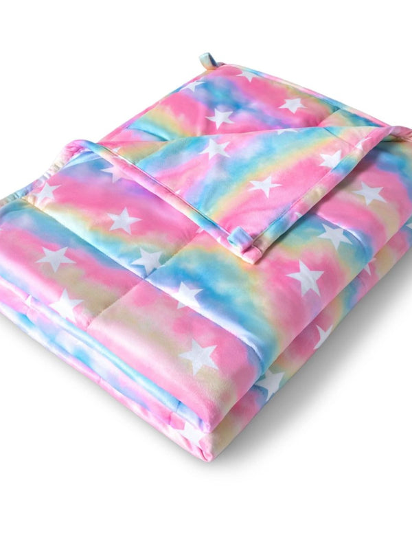 A minky weighted blanket folded neatly on a white background.