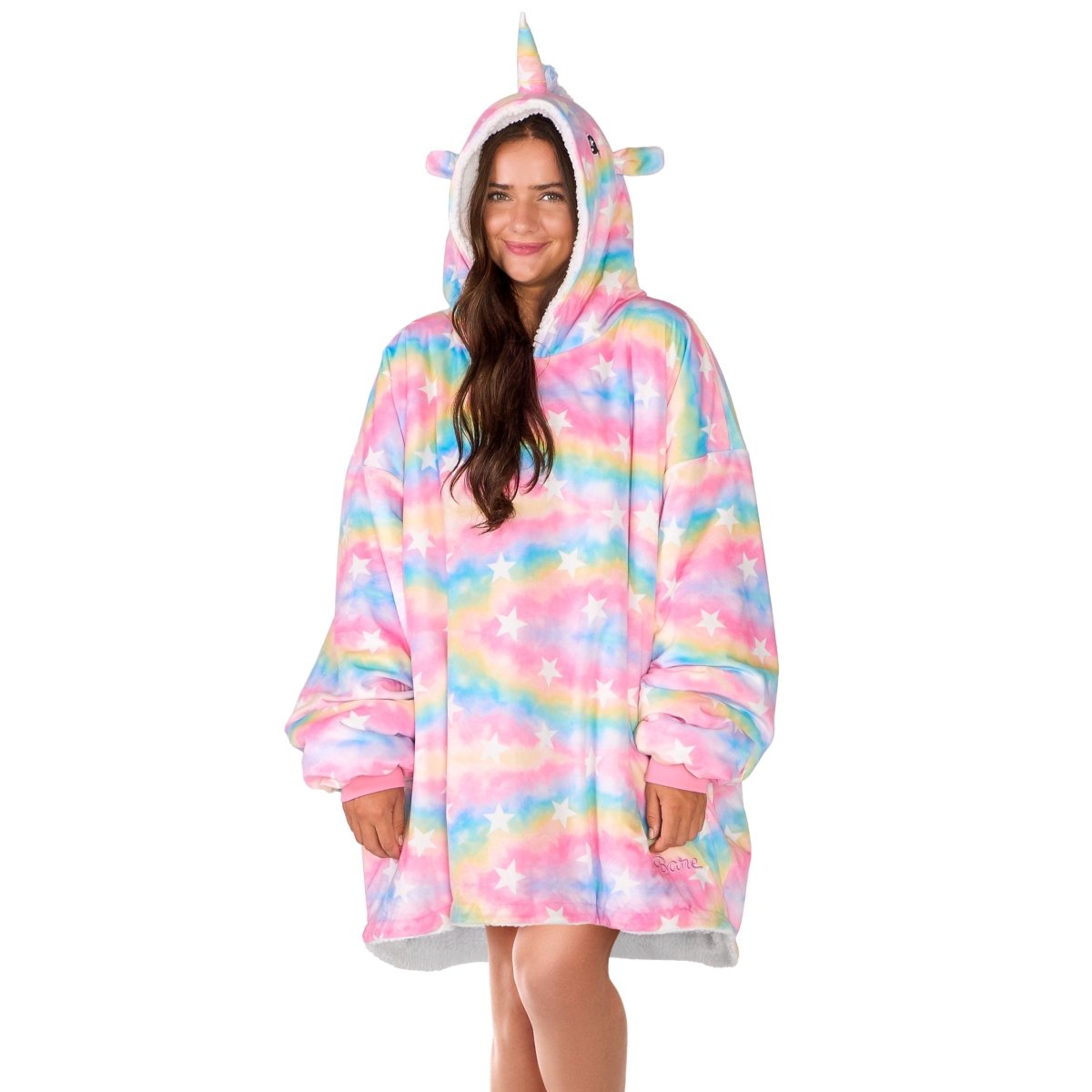 An adult with a sherpa wearable blanket on