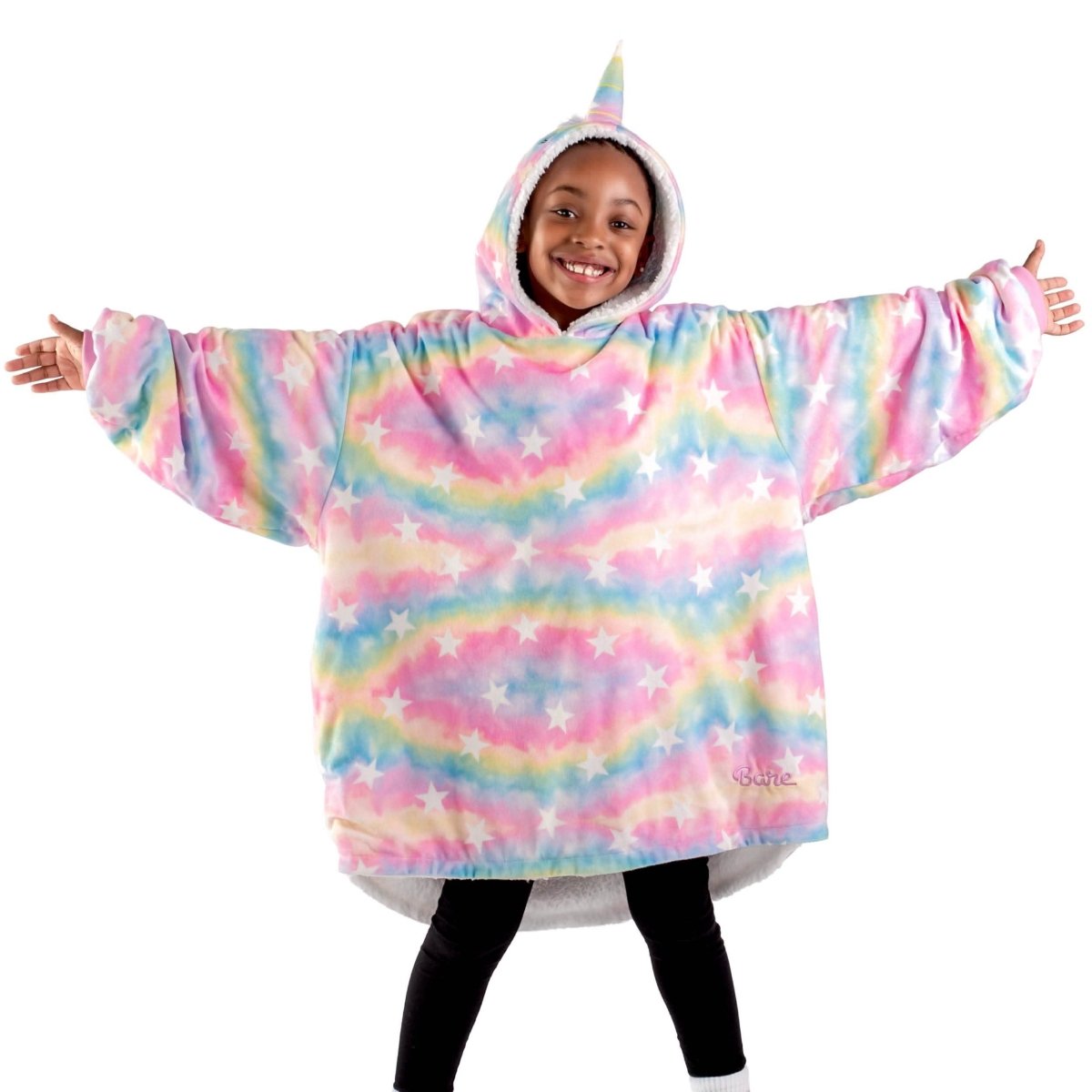 A child with a wearable blanket on