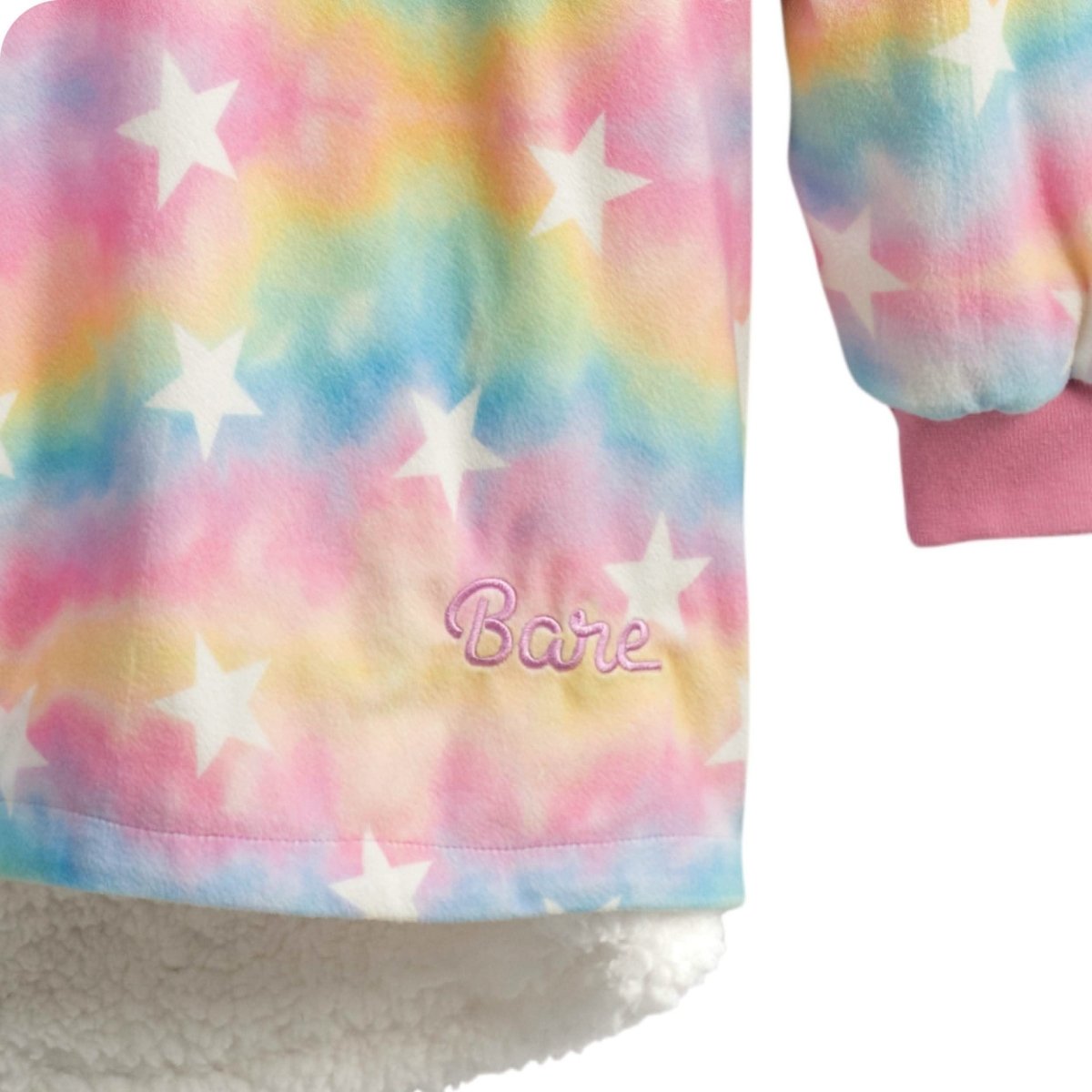 A child with a wearable blanket on